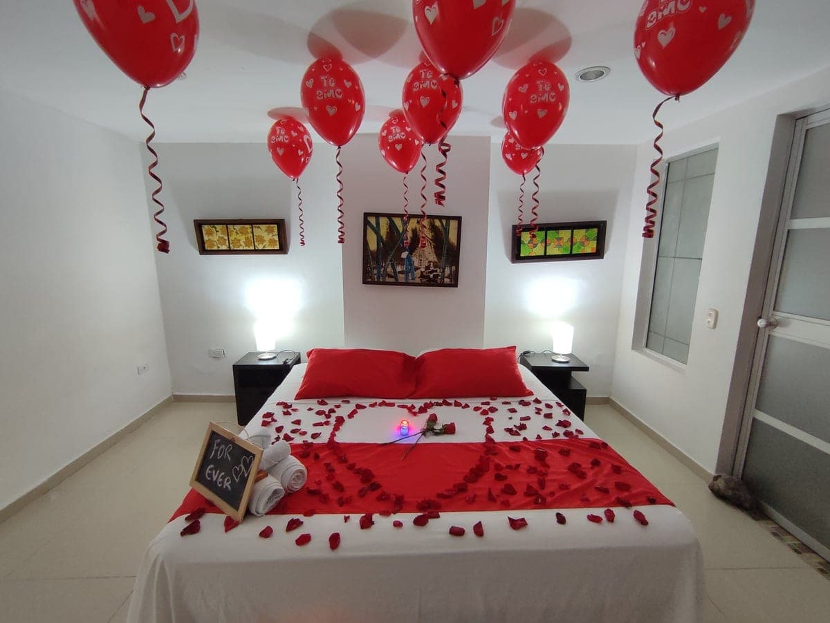 Habitación decorada para plan romántico en New Magdalena Hotel